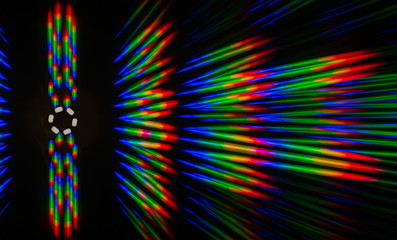 Photo of the diffraction pattern of LED array light, comprising a large number of diffraction orders obtained by the thin phase gratings - obrazy, fototapety, plakaty