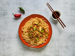 Roasted romanesco curry with nuts and pasta.
