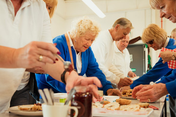 Senior Friends Having Scones