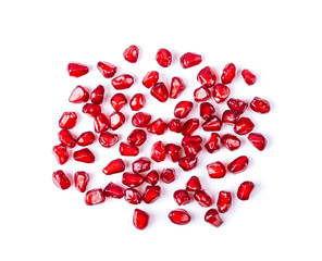 Pomegranate seeds isolated on white background. top view