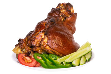 Baked pork shank with crispy caramelized crust with vegetables