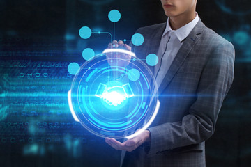 The concept of business, technology, the Internet and the network. A young entrepreneur working on a virtual screen of the future and sees the inscription: