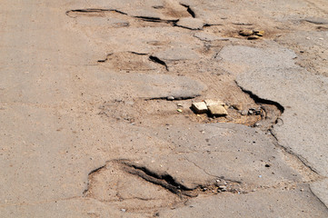 large pits with asphalt.