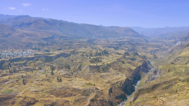 Aerial landscape of small towns and old inca terraces in Colca Valley, Peru