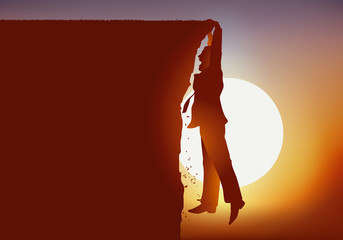 concept d’une situation périlleuse avec d’un homme qui se retrouve suspendu au dessus du vide en se tenant au bord de la falaises