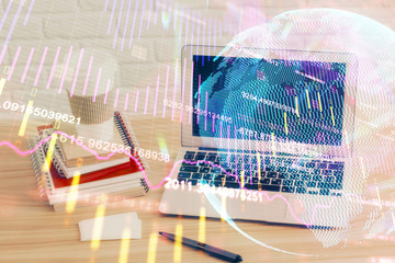 Double exposure of graph and financial info and work space with computer background. Concept of international online trading.