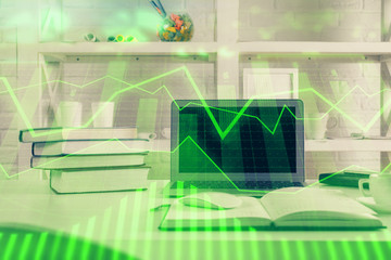 Stock market chart hologram drawn on personal computer background. Multi exposure. Concept of investment.