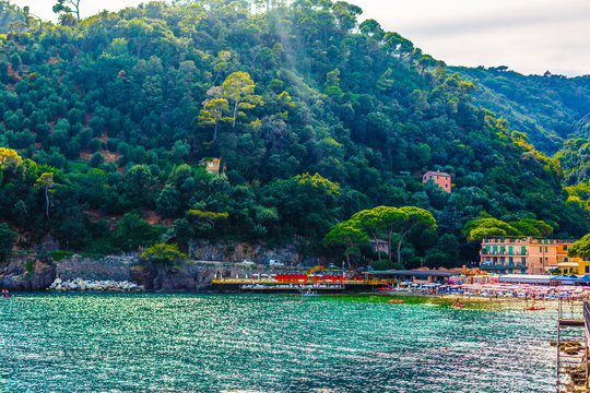 Beach next to Portofino in Italy. Beautiful bay of Paraggi. Swimming vacation in Italy