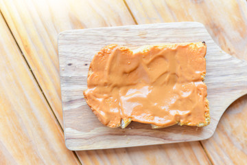 Thai Tea Custard Toast on Wooden Board