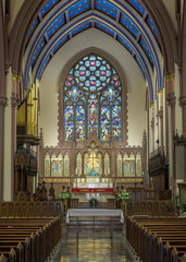 Stained glass window above altar inside the St. Paul's Episcopal Cathedral of Buffalo, New York