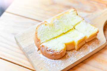 Sugar Toast with Butter on Wooden Board