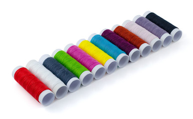 Color sewing threads isolated on white background with clipping path