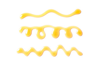 Sweet honey smears isolated on white background