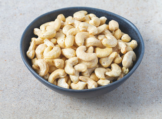 cashew nuts on granite surface