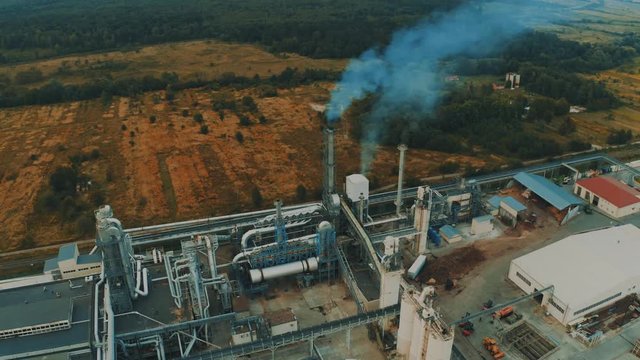 Wood waste boards manufacturing plant in western Ukraine in a rural area 4k