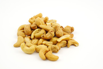 Roasted cashew nuts with salt isolate on white background