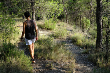 Girl going down a mountain road