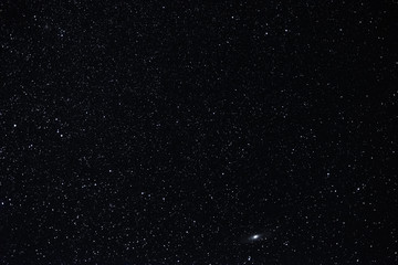 Starry sky summer night with the Andromeda nebula