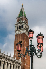 Lantern on the background of the bell tower of San Marco