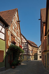 Fototapeta na wymiar Fachwerkhäuser in der Altstadt von Rothenburg ob der Tauber in Mittelfranken, Bayern, Deutschland 