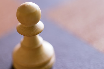 Macro Shot of a White Pawn Chess Piece