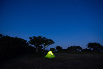 sark dark sky islands tent in the night