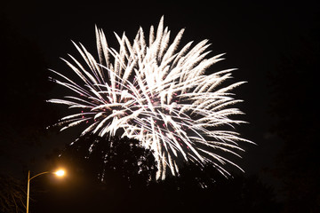 closeup of firework on city street