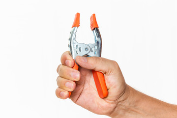 male hand holding an A clamp isolated in white background