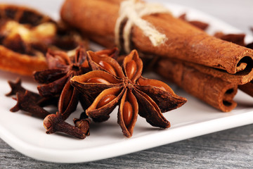 cinnamon, staranise and cloves. winter spices on wooden table