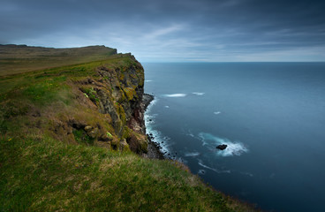 Latrabjarg cliffs in west Iceland over the ocean shore