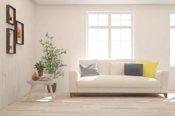 Stylish room in white color with sofa. Scandinavian interior design. 3D illustration