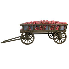 Fototapeta premium Ripe tomatoes in a wooden cart