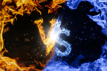 Letter VS. Blue versus Yellow fire flames on black isolated background, realistic fire effect with...