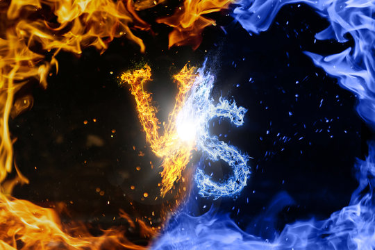 Letter VS. Blue versus Yellow fire flames on black isolated background, realistic fire effect with sparks.