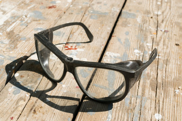 Safety glasses for worker safety when working with cutting power tools for construction and repair