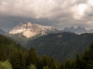 Obraz premium Aerial Landscape of the Dolomites, Sunset on a cloudy Day giving the Aferer Geisler Mountain a nice color.