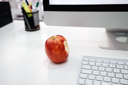 Apple on desk ar work office