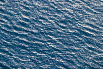 restless and turbulent blue water background