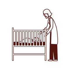 pediatrician female doctor with baby in cradle