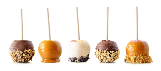 Fototapeten Variety of autumn candy apples with caramel, chocolate and nuts isolated on a white background © Jenifoto