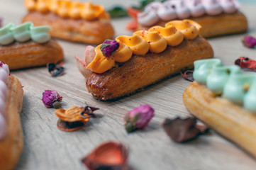 Sweet Eclairs on the Table