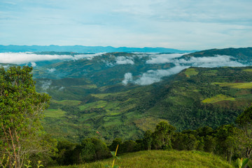 THE MOUNTAINOUS LANDSCAPE AT DAWN