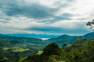 THE MOUNTAINOUS LANDSCAPE AT DAWN