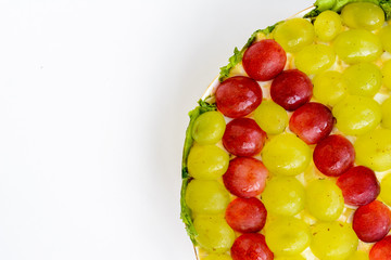 The legendary Tiffany layered salad with grapes, chicken and cheese on the white background.
