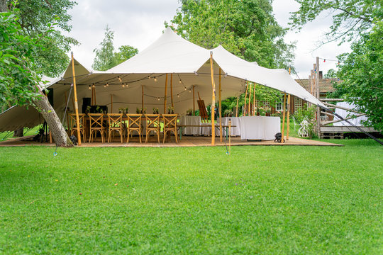 Image of huge tent for a wedding event in the nature