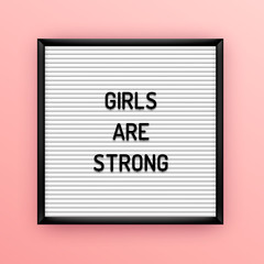 Feministic quote on square white letterboard with black plastic letters. Feminine vintage inspirational poster 80x, 90x. Girls are strong