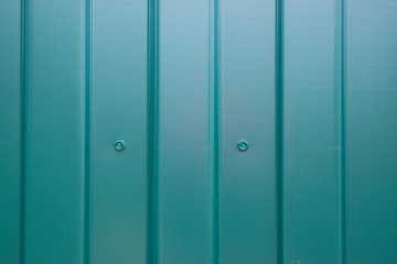 Fototapeta premium green metal galvanized fence