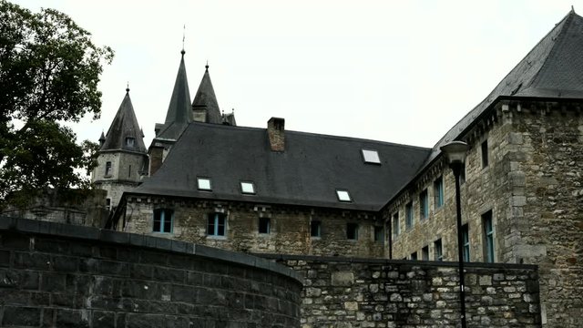 The 9th century castle on the Outhe river at small Belgian town Durbuy. 4K.