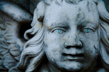 Obraz premium Death. Close up angel as symbol of pain, fear and end of life. Ancient statue.