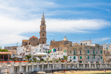 Italy, Apulia, Metropolitan City of Bari, Monopoli. Porta Vecchia (Old Port). Steeple of the...